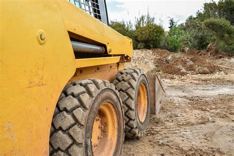 best skid steer for mud|solid vs pneumatic skid steer.